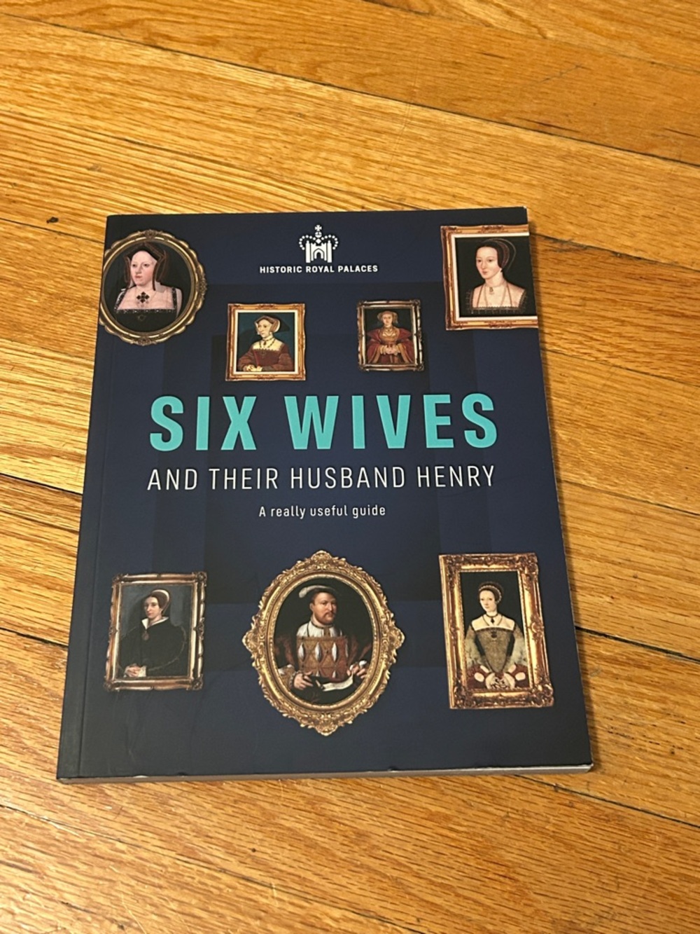 Six Wives and Their Husband Henry Book - Navy Cover with Teal Title
